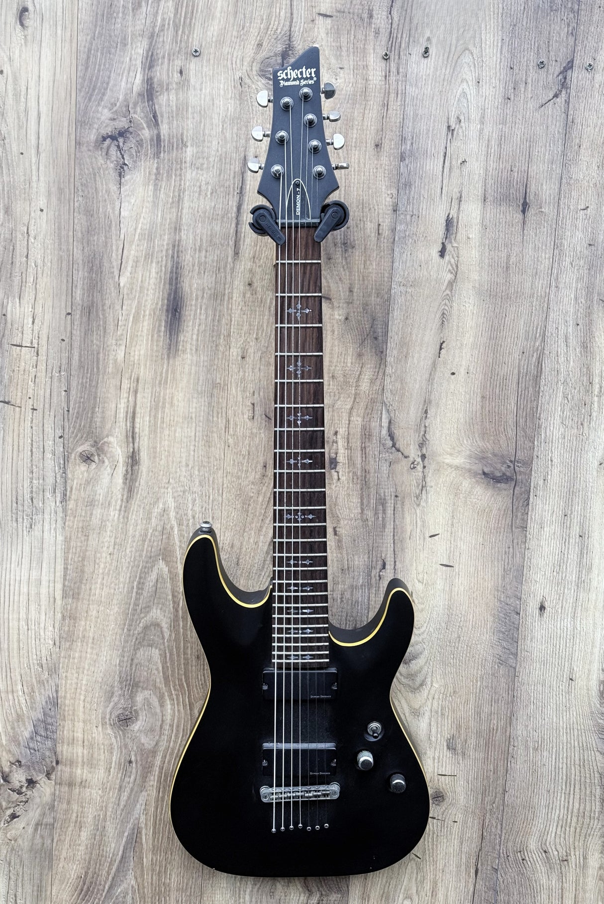 Schecter Demon 7 Aged Black Stain Diamond Series